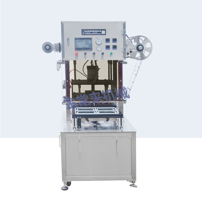 Vertical modified atmosphere locking and sealing machine