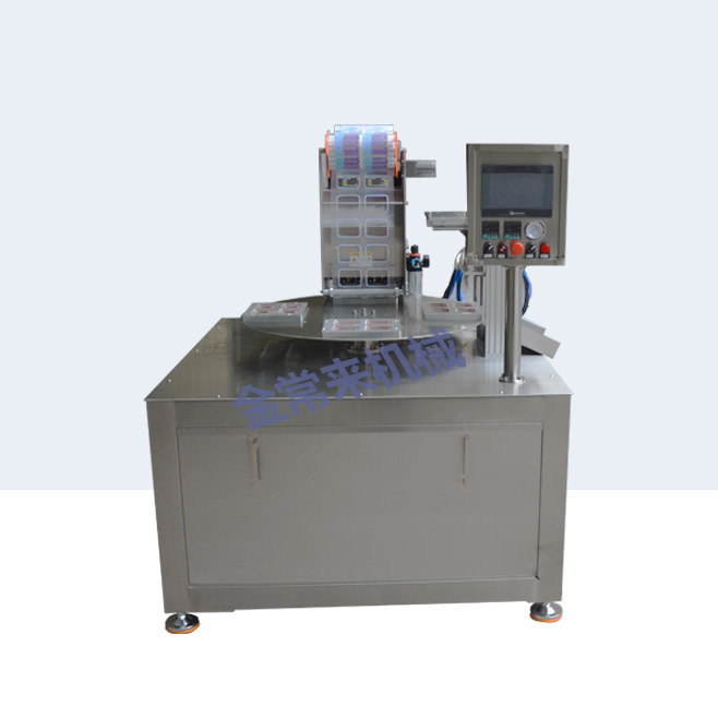 Rotary filling one out to four sealing machine